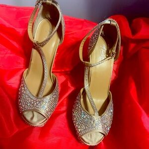 Shimmery sparkle from peep toe stiletto heels